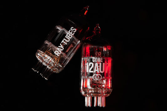 Two glass tubes labeled 'Ray Tubes' and 'CORE 12AU' on a black background