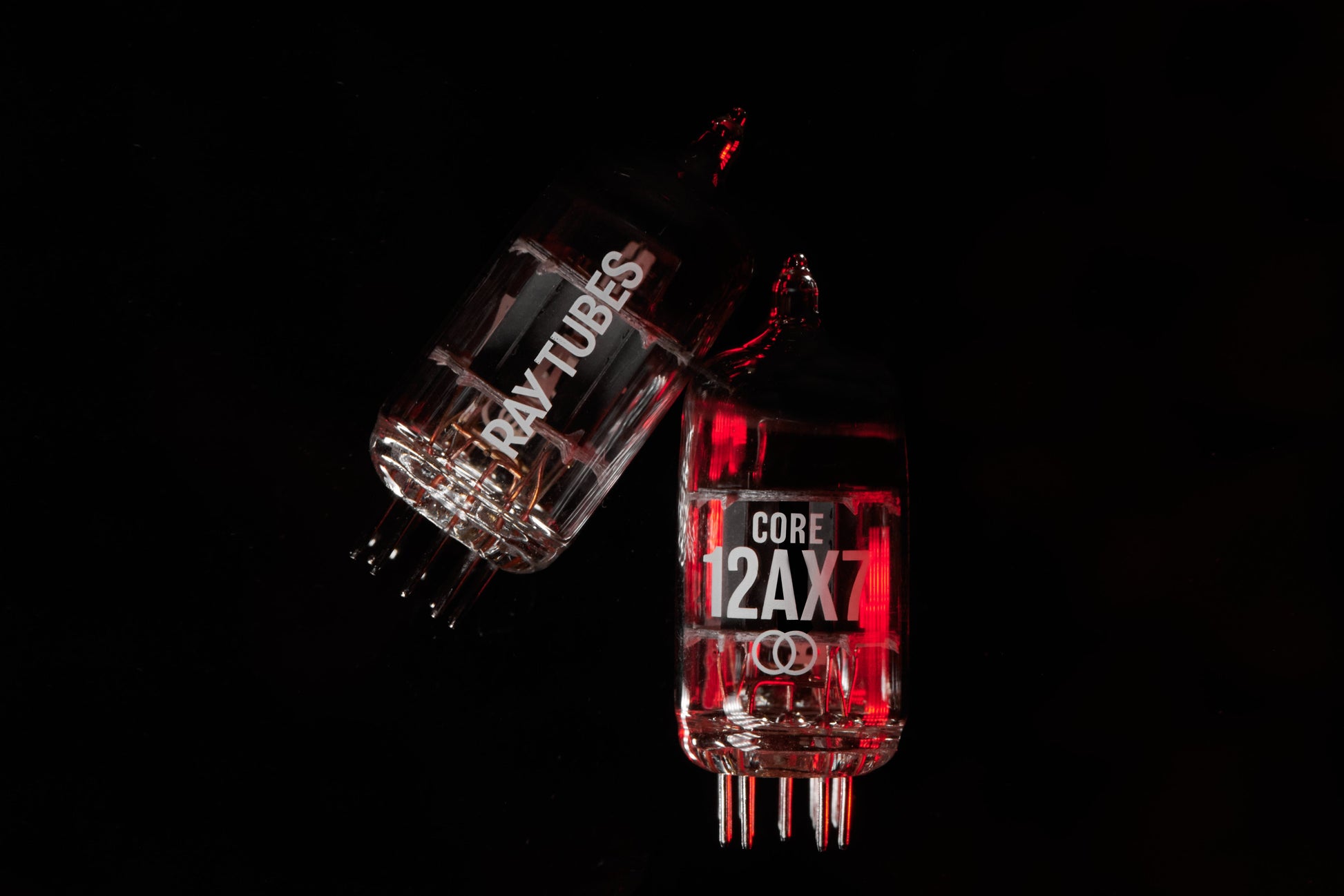 Two vacuum tubes labeled 'Ray Tubes' and 'Core 12AX7' on a black background