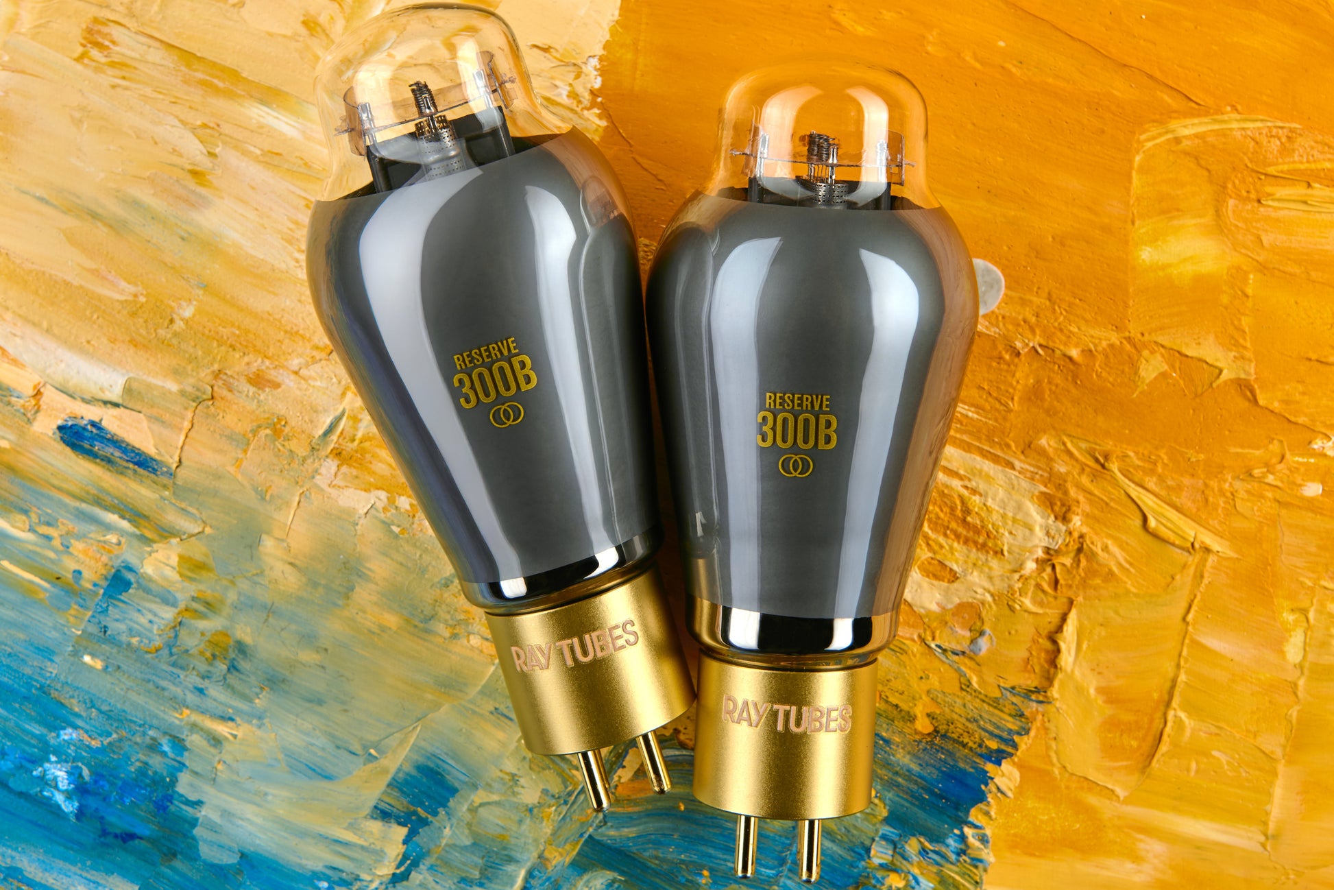 Two vacuum tubes with 'Ray Tubes' branding on a colorful abstract background