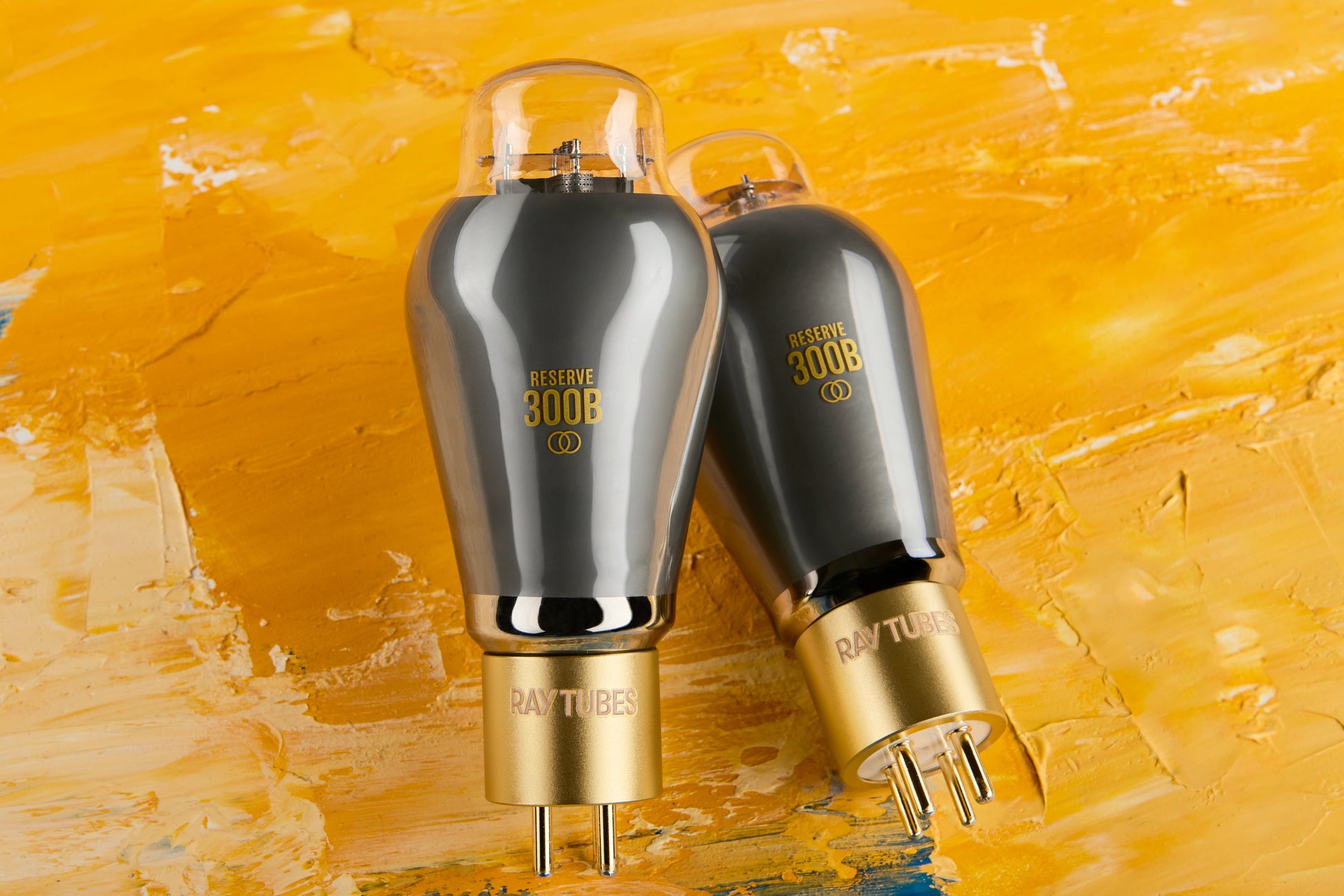 Two vacuum tubes on a colorful abstract background
