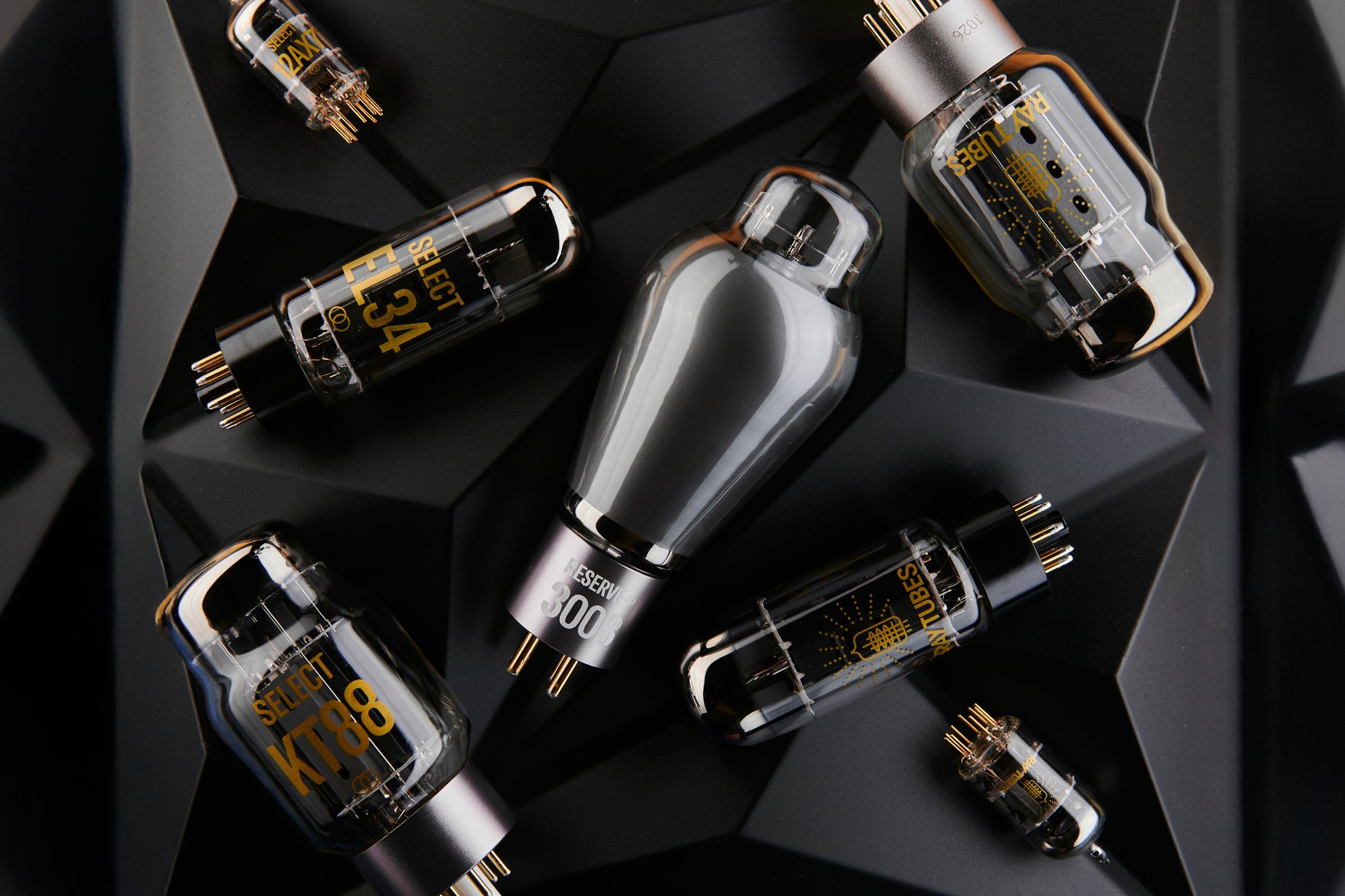 Set of electronic tubes on a dark geometric background