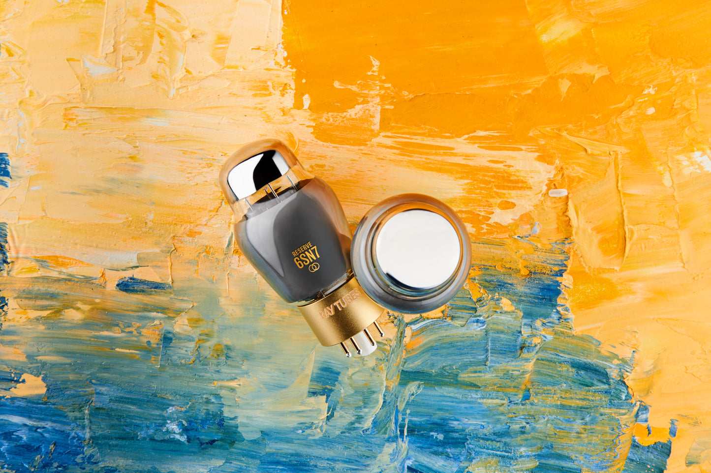 Vacuum tube with gold cap on a colorful abstract background