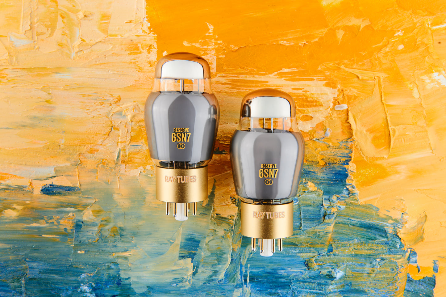 Two vacuum tubes with '6SN7' marking on a colorful abstract background