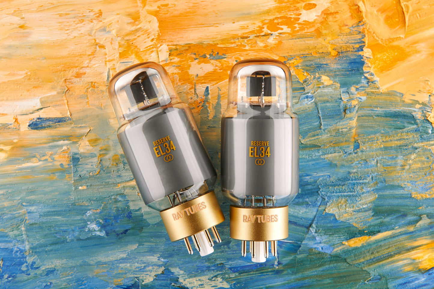 Two vacuum tubes with gold bases on a colorful abstract background