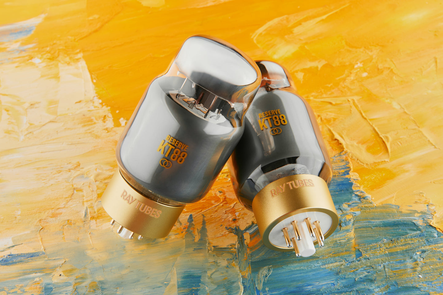 Two vacuum tubes on a textured yellow and blue background
