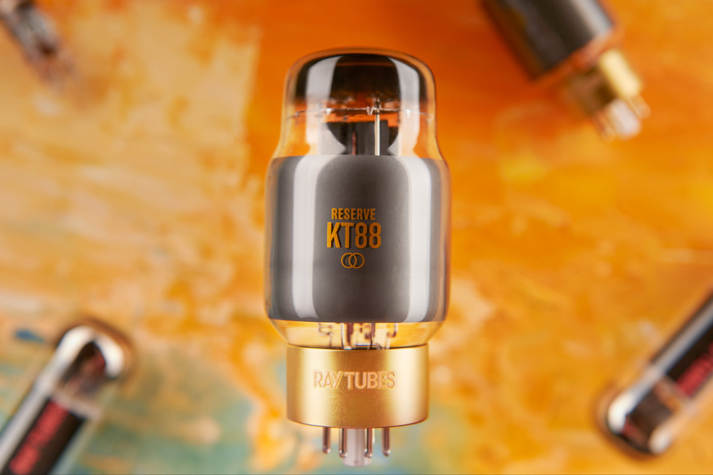 Vacuum tube with 'RESERVE KT88' marking on a blurred background