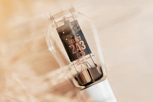 Vacuum tube with 'SELECT 2A3' branding on a beige background