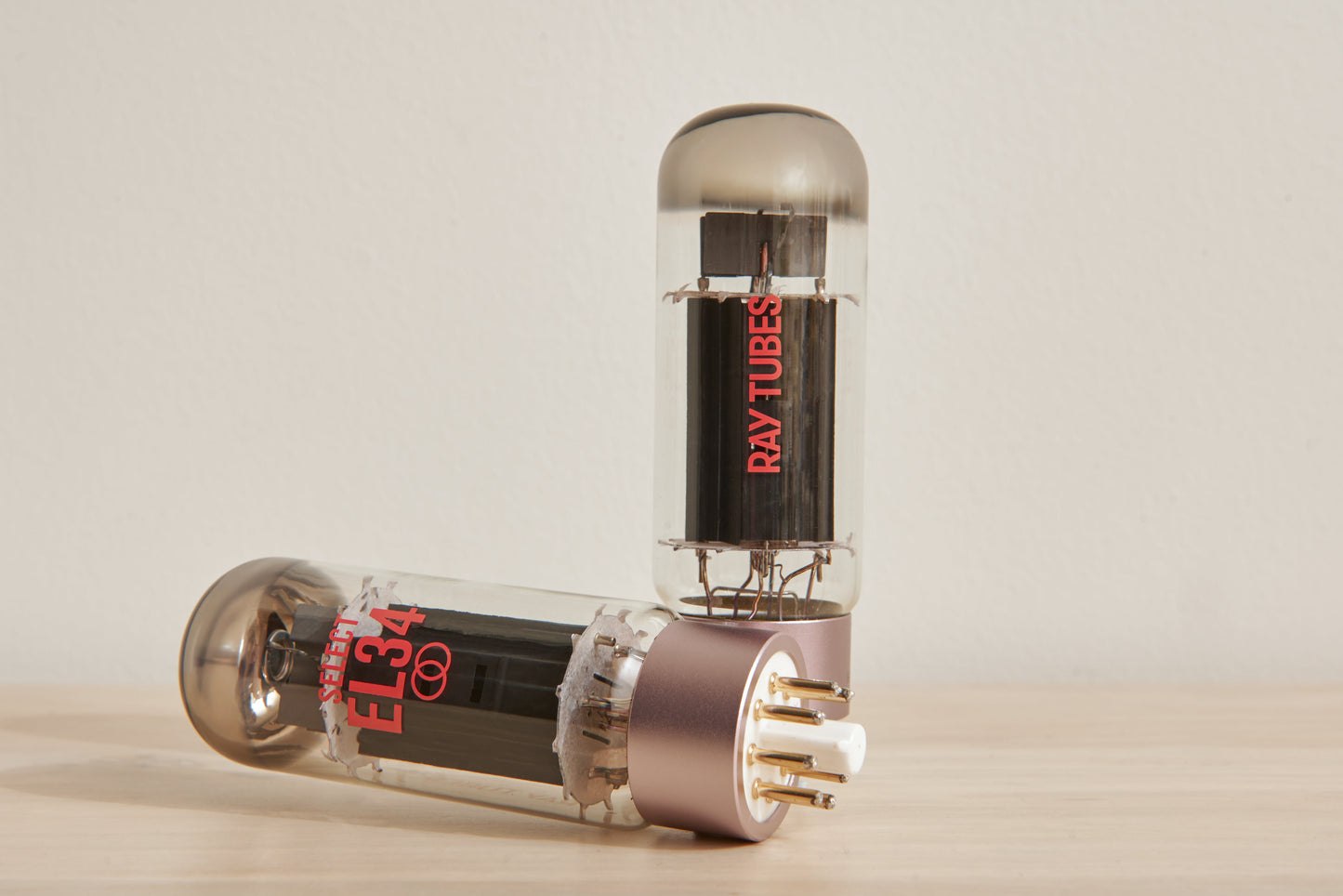 Vacuum tube with 'Ray Tubes' branding on a beige background