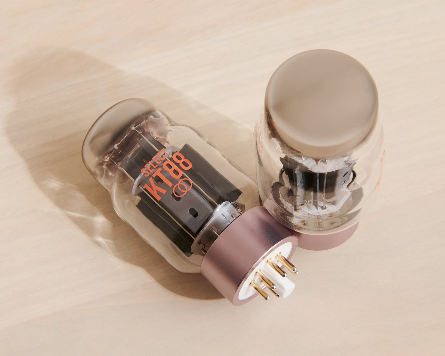 Vacuum tube amplifier on a beige surface